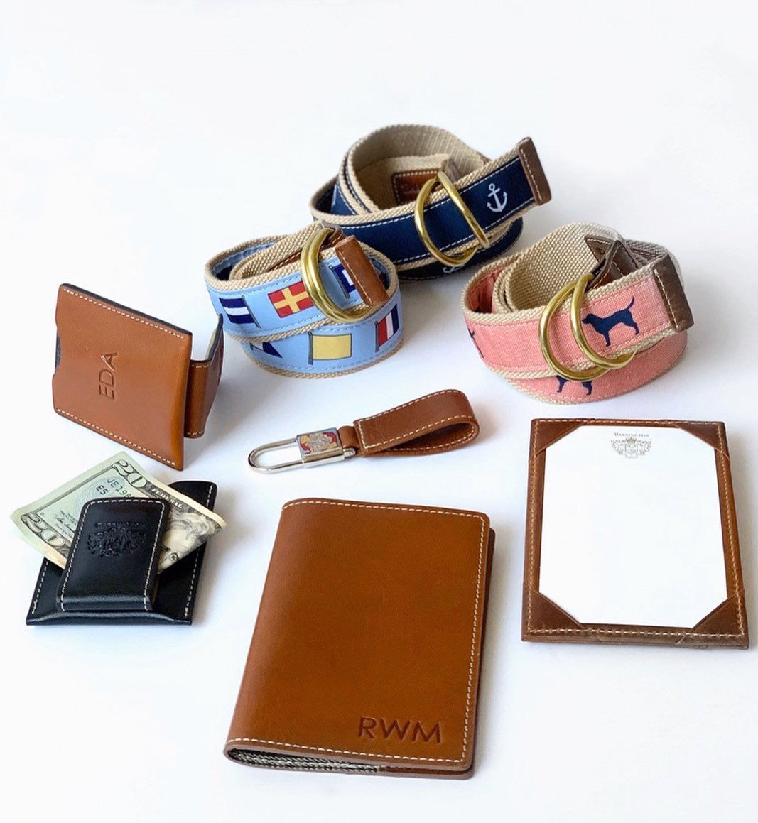 A collection of Barrington Gifts leather money clips, stylish woven belts, and a leather keychain, showcasing the quality materials and craftsmanship used in our accessories and money clips.